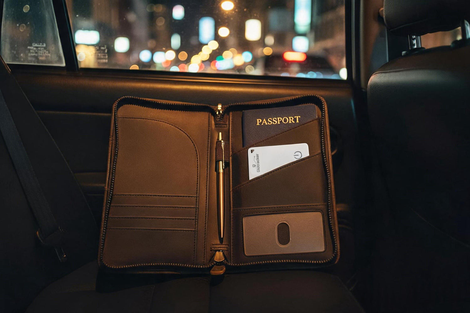 Glotracker circular Bluetooth tracker in passport holder inside car at night — GPS locator for travel documents